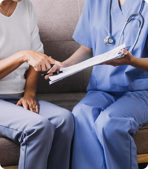 Consultant paediatrician reviewing notes with a parent